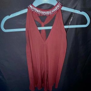 Burgundy top with beaded neckline